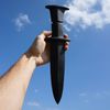 ground and polished stone sword